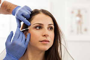 Woman getting injected with Botox